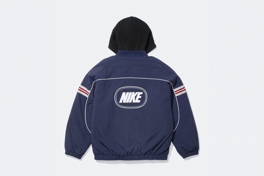 Lacivert naylon ceket arkadan, oval Nike logosu