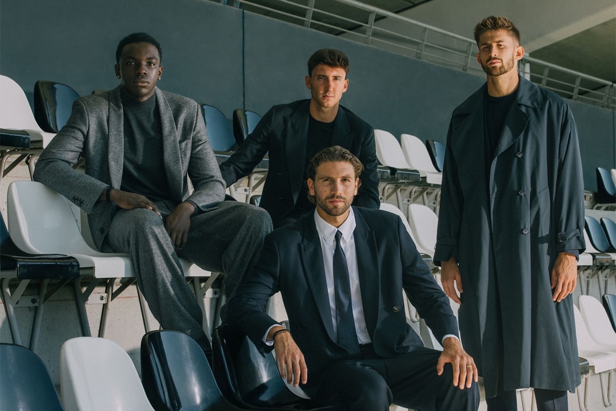 Giorgio Armani Juventus takımları giyen futbolcular tribünde