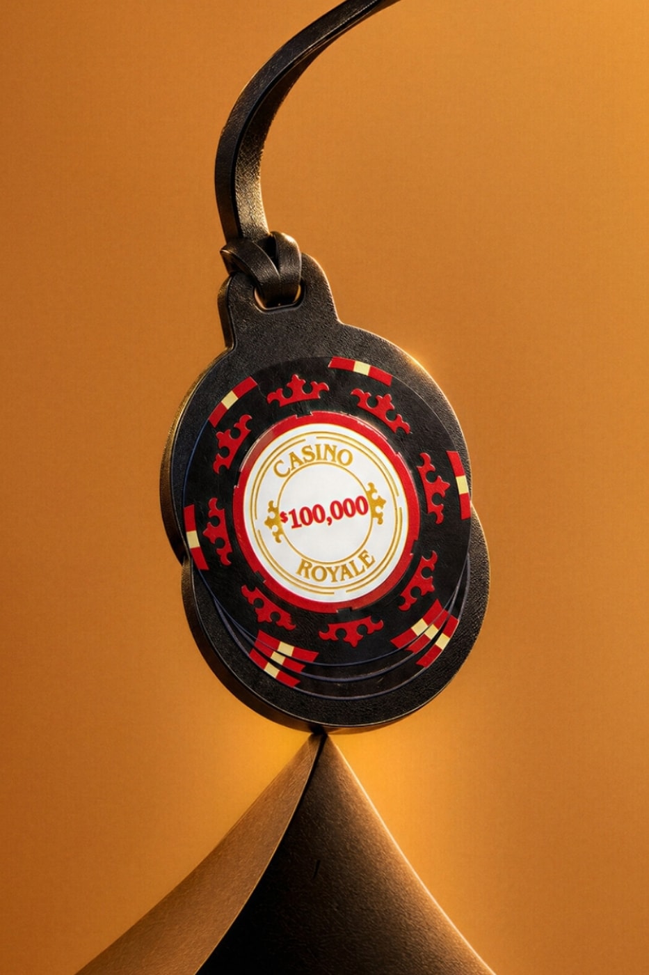 Poker fişi şeklinde Globe-Trotter Casino Royale bagaj etiketi